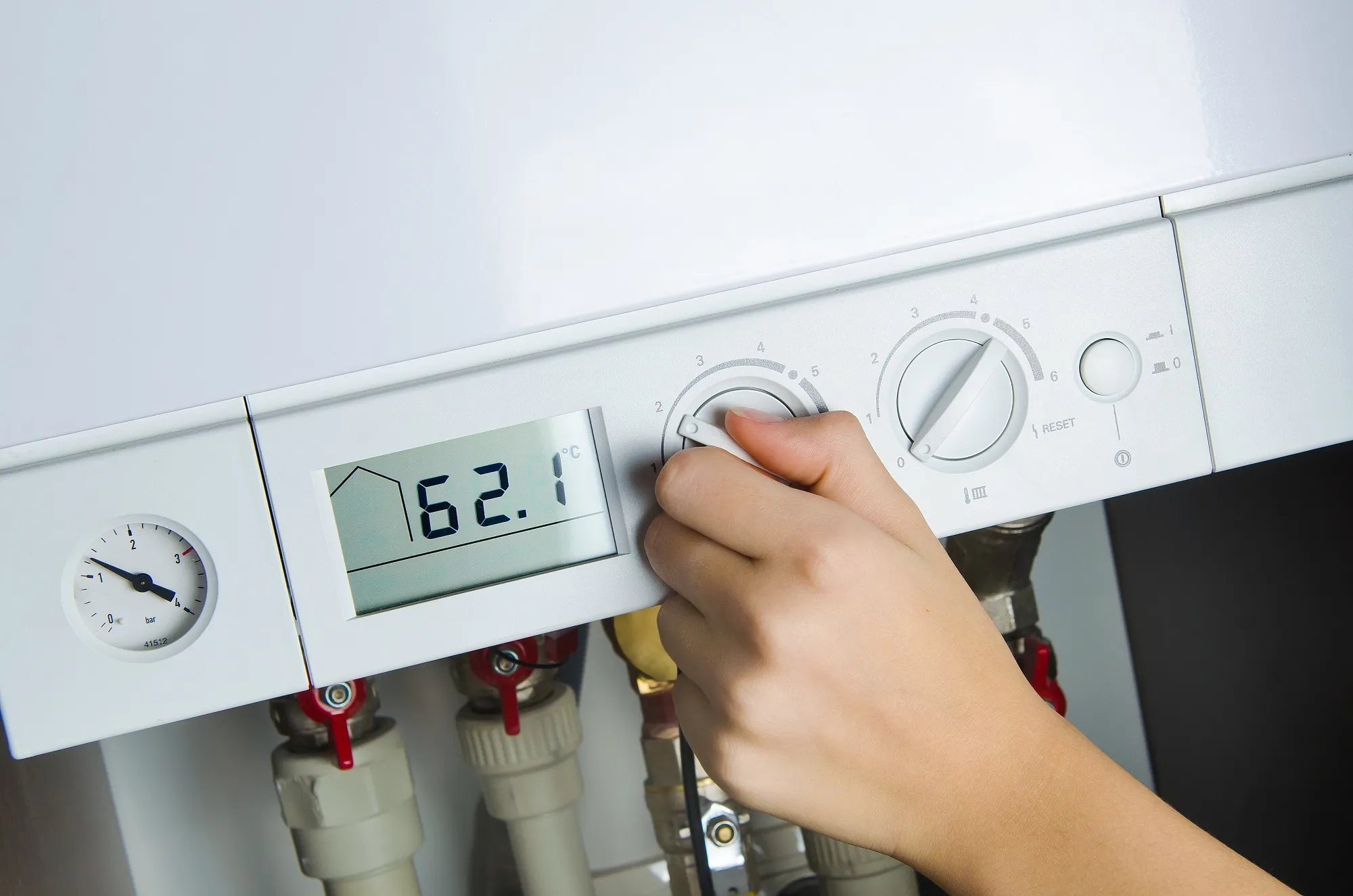 Boiler controls being set, heating work carried out by James Plumbing and Heating